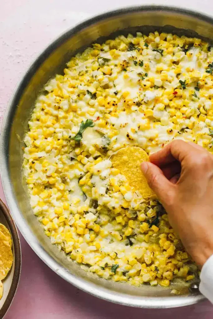 Cheesy Green Chile Sweet Corn by Heartbeet Kitchen - perfect as a side dish for any grilled mains.
