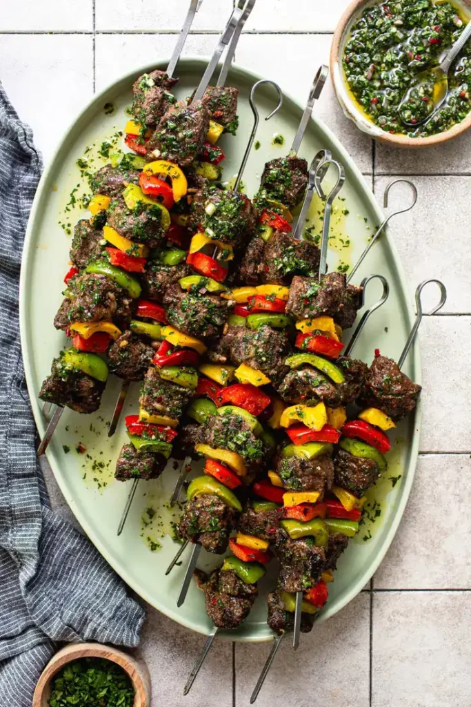 Grilled Chimichurri Steak Kabobs by Butter Be Ready - the ultimate party-friendly bite.
