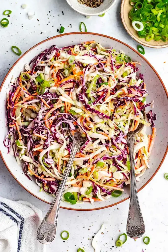Creamy Coleslaw by Two Peas & Their Pod - perfect side for BBQ, burgers, or tacos.
